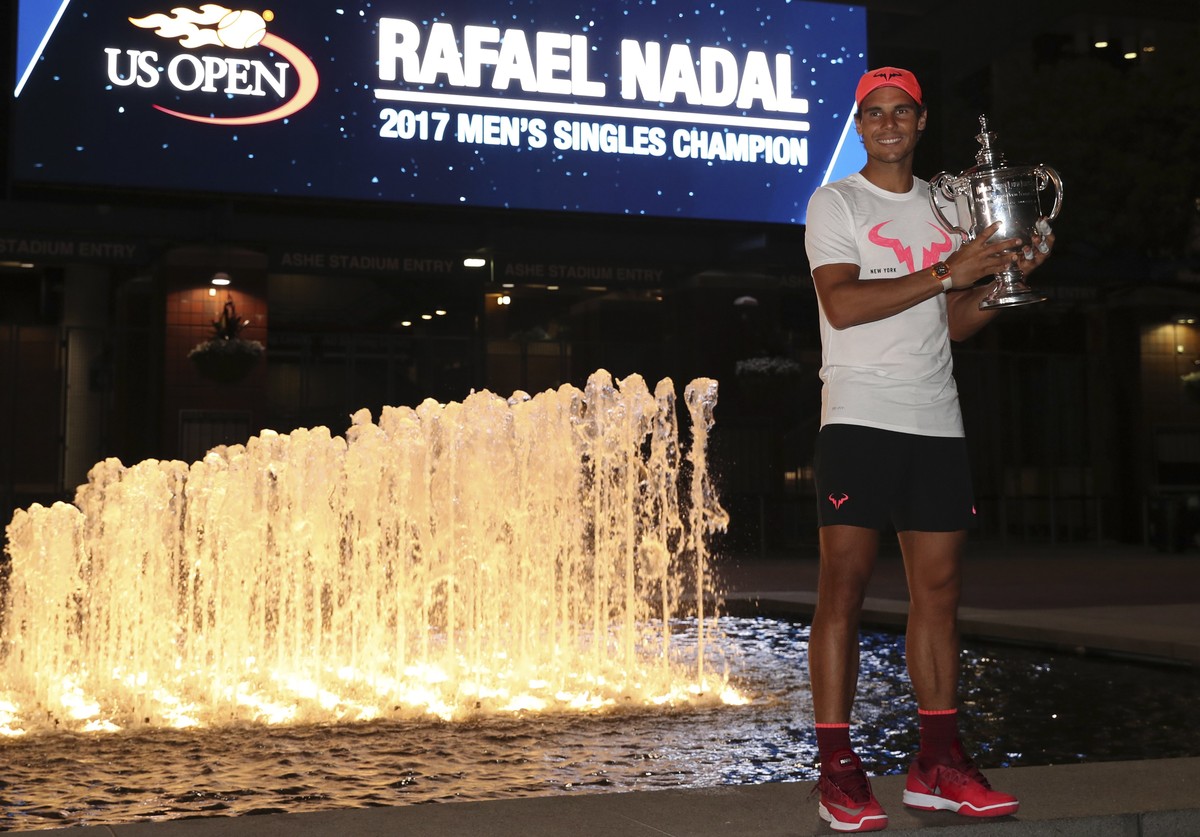 epa06197486 Rafael Nadal of Spain poses with his championship trophy during a photo opportunity after defeating Kevin Anderson of South Africa to win the US Open Tennis Championships men's final  ...