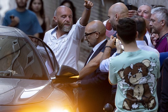 epa11590041 Former Italian Culture Minister Gennaro Sangiuliano (C) leaves the ministry, in Rome, Italy, 06 September 2024. Gennaro Sangiuliano resigned as Culture Minister on 06 September after being ...