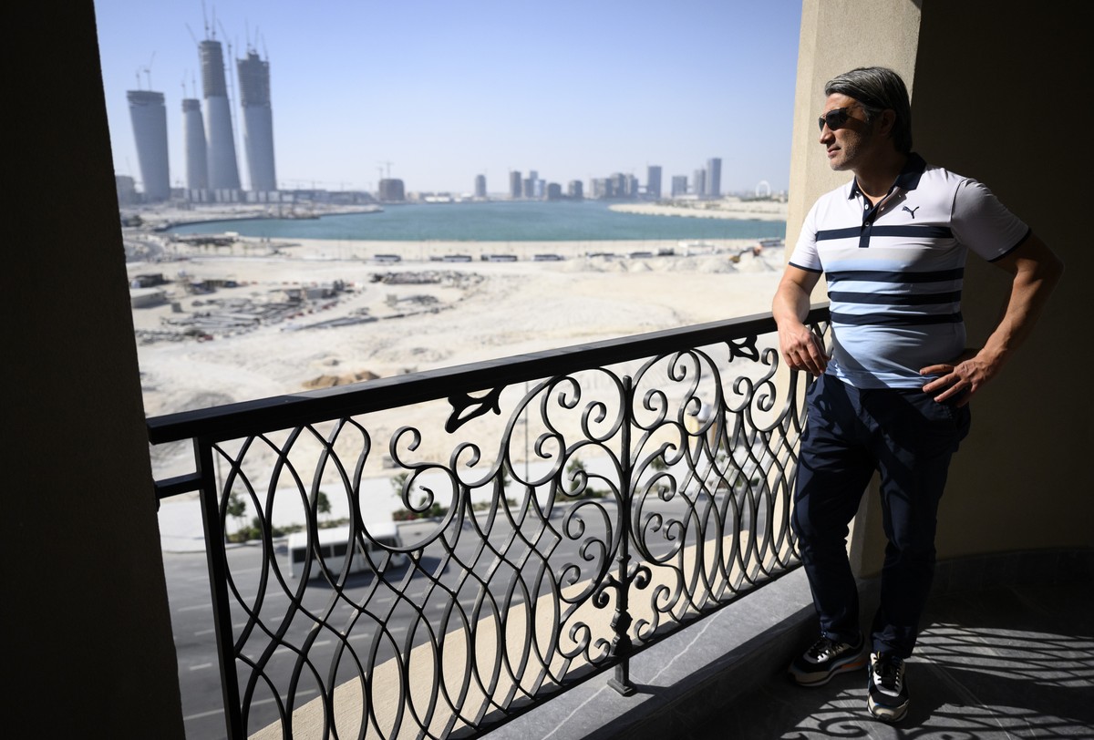 Switzerland's soccer national team head coach Murat Yakin looking at the view from a room of the hotel "Le Royal Meridien" during his visit of the hotel as they choose the Switzerland t ...