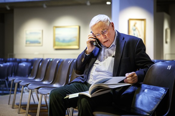 Former Swiss Federal councilor Christoph Blocher makes a phone call prior to a media visit of the exhibition of his collection entitled "Chefs-d??uvre suisses" (Swiss masterpieces in French) ...