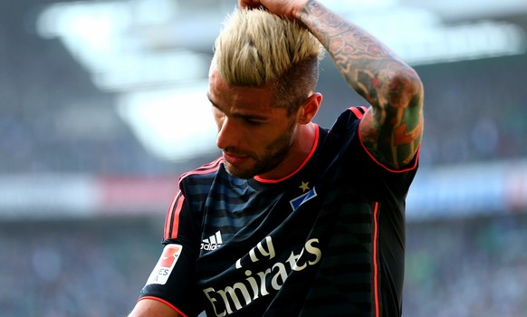 BREMEN, GERMANY - APRIL 19: Valon Behrami of Hamburg walks off dejected off the pitch during the Bundesliga match between SV Werder Bremen and Hamburger SV at Weserstadion on April 19, 2015 in Bremen, ...