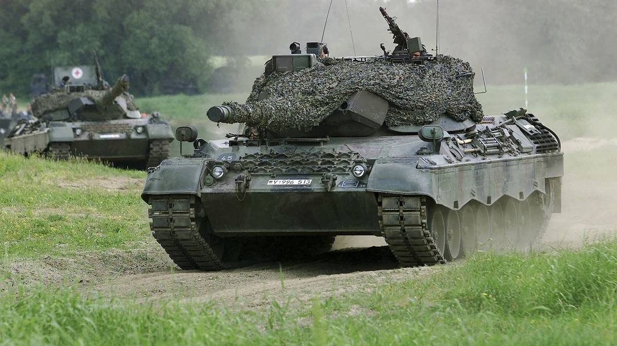 FILE - A Leopard 1 tank drives in Storkau, Germany, on May 19, 2000. Ukraine may be able to add old Leopard 1 battle tanks from German defense industry stocks to deliveries of modern tanks that German ...