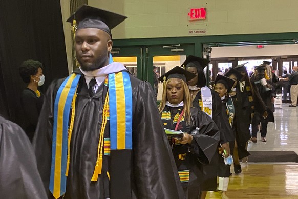 Participants in Wilberforce University&#039;s May, 2022, commencement walk through the school in Wilberforce, Ohio. Historically Black colleges and universities, which had seen giving from foundations ...