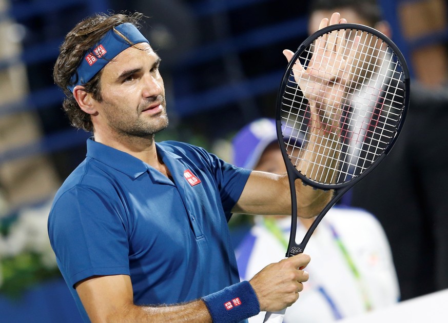 epa07404745 Roger Federer of Switzerland celebrates after winning his quarter final match against Marton Fucsovics of Hungary at Dubai Duty Free Tennis ATP Championships 2019 in Dubai, United Arab Emi ...