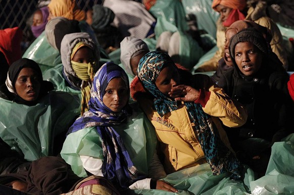 epa04186170 An image made available on 30 April 2014 shows migrants being rescued during operation &#039;Mare Nostrum&#039; in southern Mediterranean sea off the Italian coast, 29 April 2014. The Mare ...