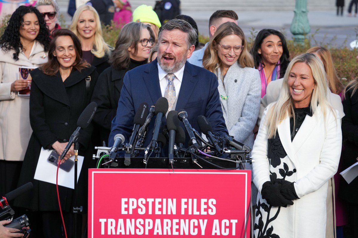 Rep. Thomas Massie, R-Ky., and Rep. Marjorie Taylor-Greene, R-Ga., right, speak during a news conference as the House prepares to vote on the Epstein Files Transparency Act, at the Capitol in Washingt ...
