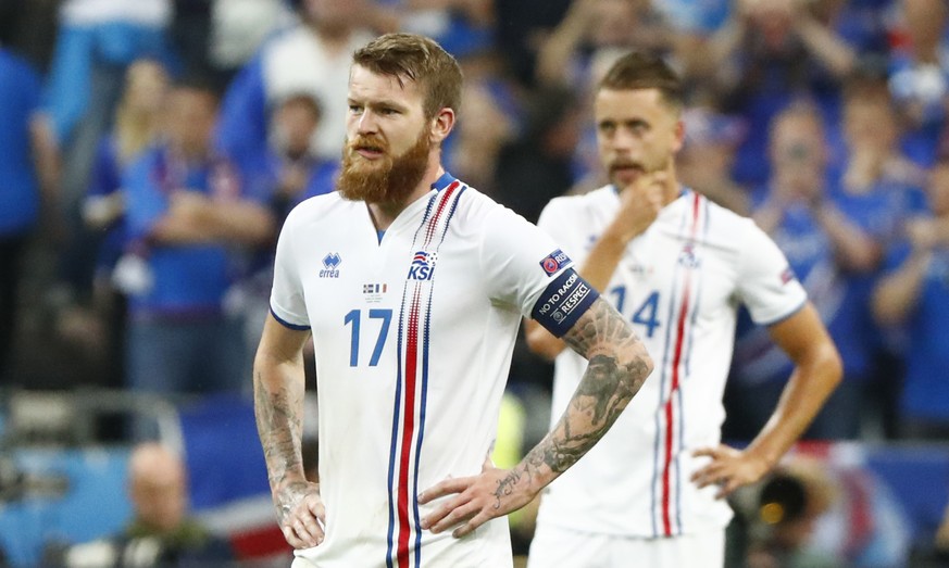 Football Soccer - France v Iceland - EURO 2016 - Quarter Final - Stade de France, Saint-Denis near Paris, France - 3/7/16
Iceland&#039;s Aron Gunnarsson and Iceland&#039;s Kari Arnason react after Fr ...