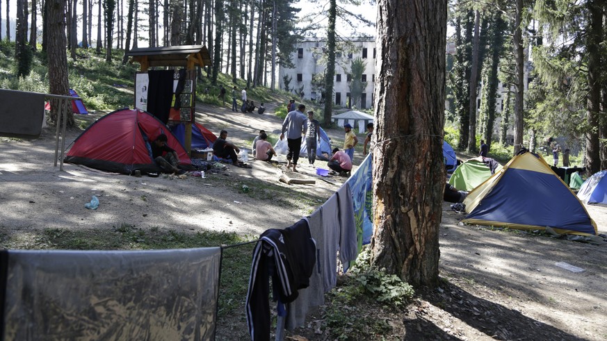 A view of a makeshift migrant camp in Bihac, 450 kms northwest of Sarajevo, Monday, Aug. 13, 2018. A few dozen people have gathered in the northwestern Bosnian town of Bihac to protest the government’ ...