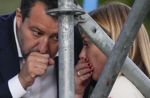 The League&#039;s Matteo Salvini, left, chats with Brothers of Italy&#039;s Giorgia Meloni on the stage of the center-right coalition closing rally in Rome Thursday, Sep. 22, 2022. Italians will vote  ...