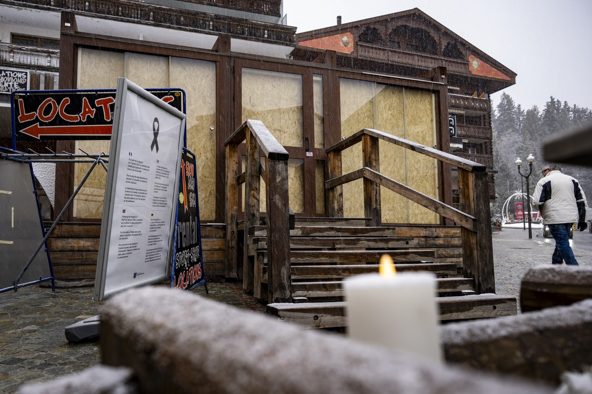 epa12687982 The entrance of the 'Le Constellation' bar after the fire at the bar and lounge in Crans-Montana, Switzerland, 28 January 2026. Swiss authorities have confirmed 40 fatalities, mo ...