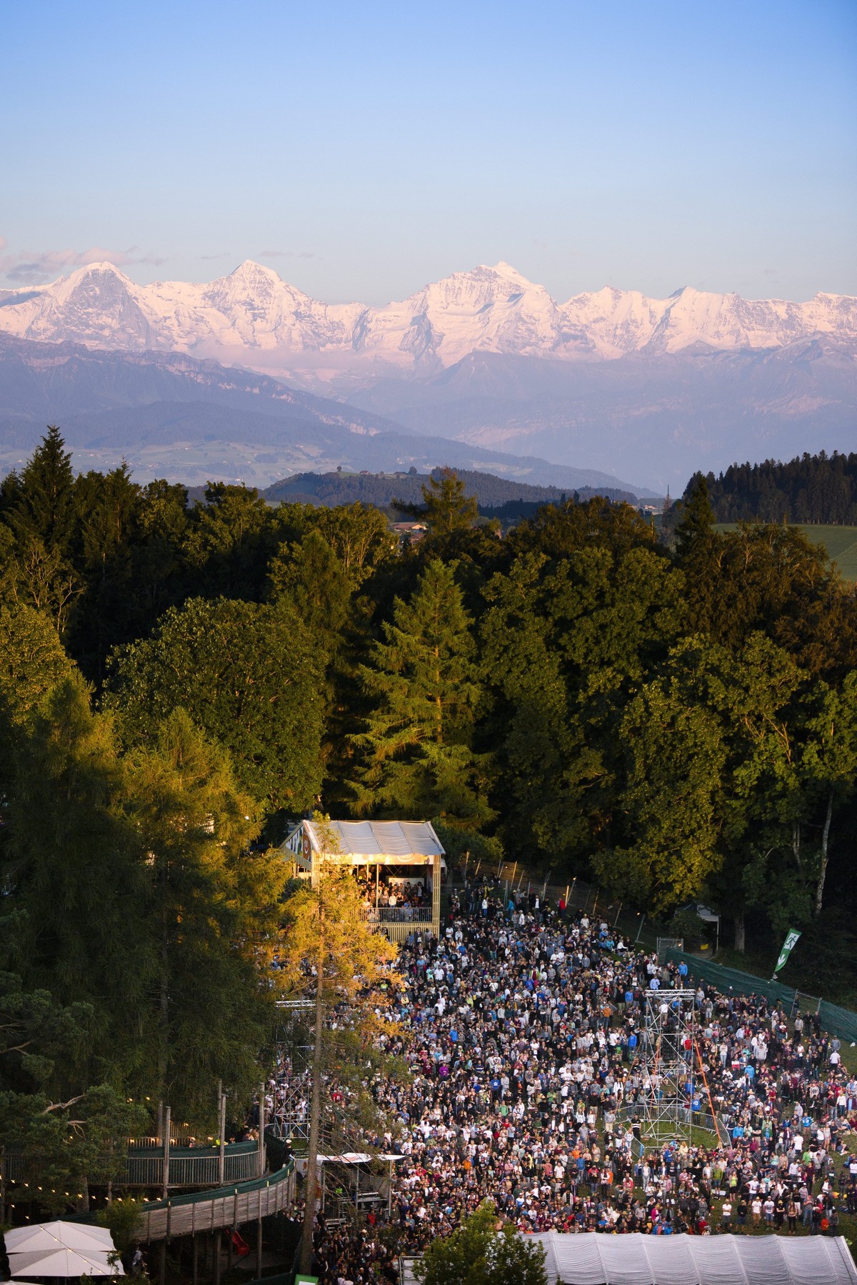epa05428538 A general view showing the crowd in front of the 'Waldbuehene' stage at the Gurten Music Open Air Festival in Bern, Switzerland, 16 July 2016. The Gurten Festival runs from 14 to ...