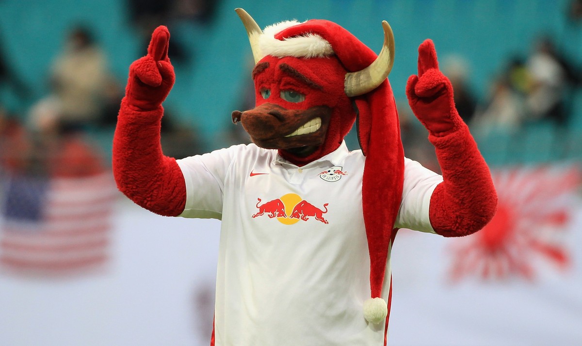 LEIPZIG, GERMANY - DECEMBER 13: Mascot Bulli of Leipzig with Christmas cap during the Second Bundesliga match between RB Leipzig and FSV Frankfurt at Red Bull Arena on December 13, 2015 in Leipzig, Ge ...