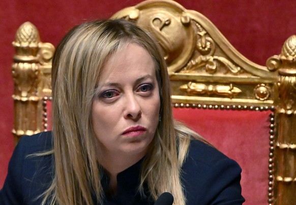 epa10364790 Italian Prime Minister Giorgia Meloni attends a session at the Lower House before European Council summit in the Senate hall, Rome, Italy, 14 December 2022. Meloni called on the EU to help ...