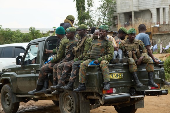 Soldiers patrol as thousands of people fleeing fighting in Congo's South Kivu province arrive in Cibitoke, Kansega, Burundi, Thursday, Dec. 11, 2025. (AP Photo/Berthier Mugiraneza)
Burundi Congo  ...