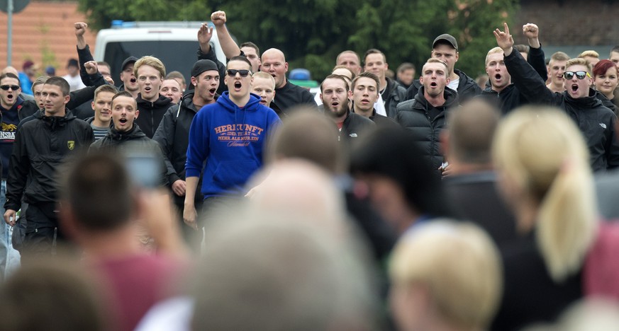 Protestors demonstrate against the accommodation for immigrants in Freital near Dresden, eastern Germany, Friday, June 26, 2015. Members of Pegida, the right-wing movement that staged regular rallies  ...