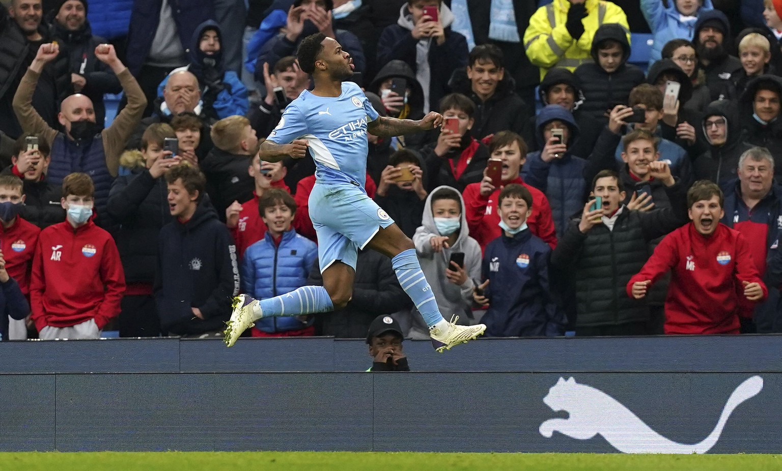 Manchester City&#039;s Raheem Sterling celebrates after scoring his side&#039;s first goal on a penalty kick during the English Premier League soccer match between Manchester City and Wolverhampton Wa ...
