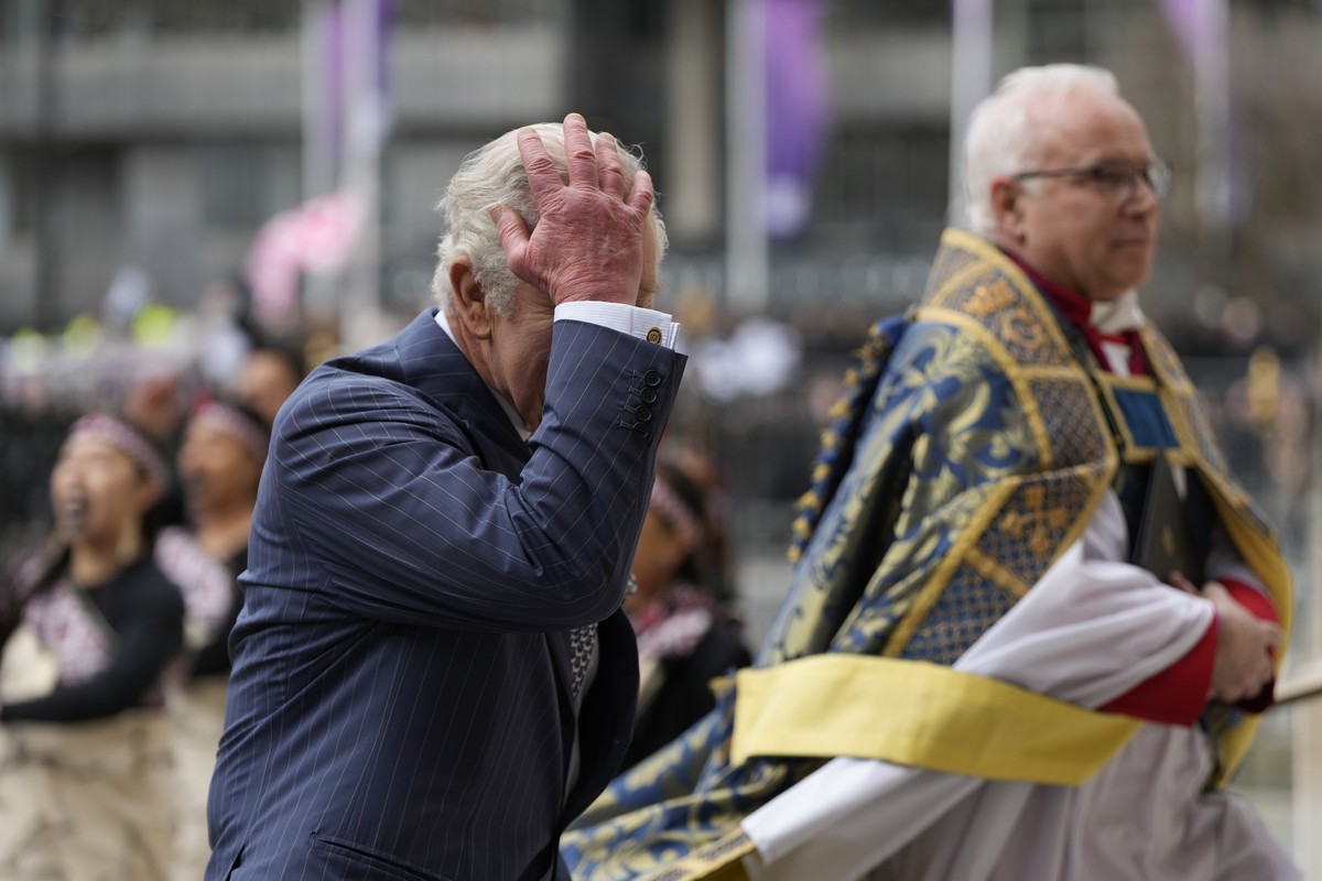 Britain's King Charles III, left, arrives to attend the annual Commonwealth Day service at Westminster Abbey in London, Monday, March 13, 2023. (AP Photo/Frank Augstein)