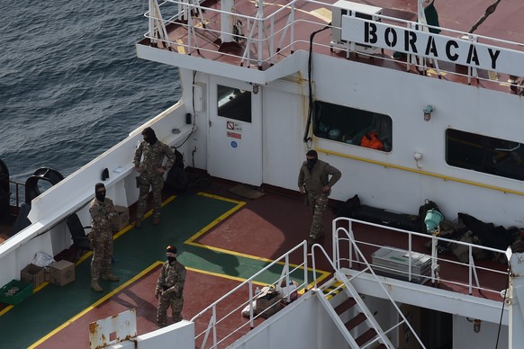 Soldiers stand on the tanker Boracay that allegedly belongs to Russia&#039;s so-called shadow fleet, Thursday, Oct. 2, 2025, off Saint-Nazaire, France&#039;s Atlantic coast. (AP Photo/Mathieu Pattier) ...
