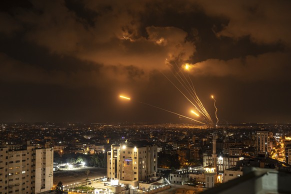 Rockets fired by Palestinian militants toward Israel, in Gaza City, Friday, Aug. 5, 2022. Palestinian officials say Israeli airstrikes on Gaza have killed at least 10 people, including a senior milita ...