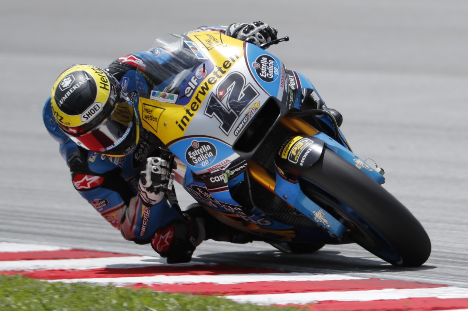 Honda rider Thomas Luthi of Switzerland steers his bike during the Malaysia MotoGP at the Sepang International Circuit in Sepang, Malaysia, Sunday, Nov. 4, 2018. (AP Photo/Vincent Thian)