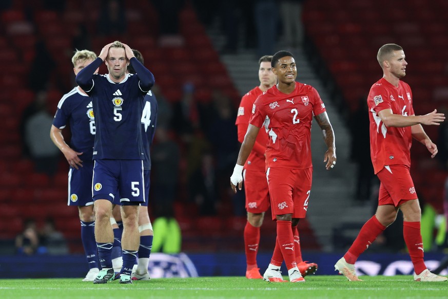 Scotland's Stephen Welsh, left, reacts at the the end of the Nations League soccer match between Scotland and Switzerland in Glasgow, Scotland, Tuesday, Sept. 29, 2026. (AP Photo/Scott Heppell)
S ...