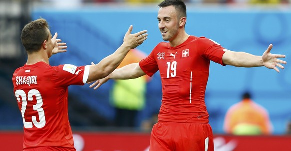 Switzerland&#039;s Xherdan Shaqiri (L) celebrates his goal with teammate Josip Drmic during their 2014 World Cup Group E soccer match against Honduras at the Amazonia arena in Manaus June 25, 2014. RE ...