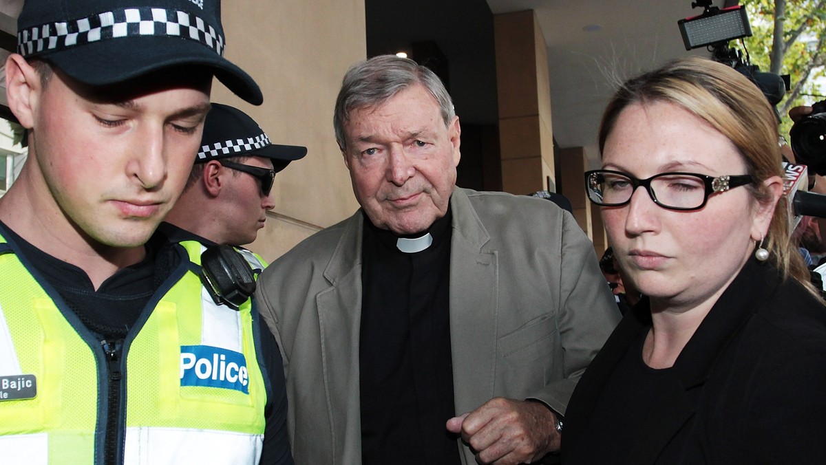 epa06581623 Cardinal George Pell (C) leaves the Melbourne Magistrates Court in Melbourne, Australia, 05 March 2018. Australia's most senior Catholic leader, Cardinal George Pell appeared at court ...