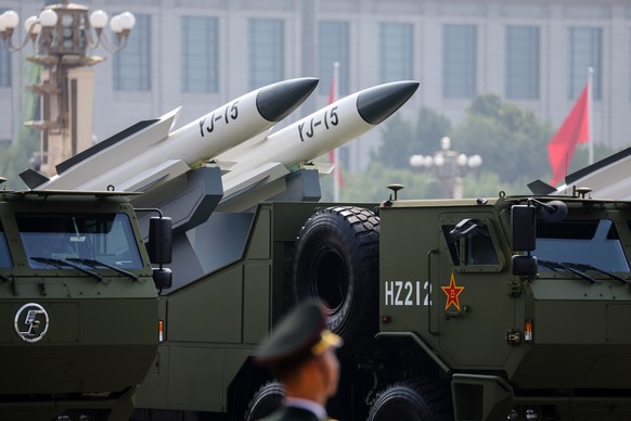 epa12347667 Armoured vehicles carrying the YJ-15 hypersonic missiles are seen during a military parade marking the 80th anniversary of the end of the Sino-Japanese War in Beijing, China, 03 September  ...