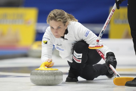 Switzerland&#039;s skip Silvana Tirinzoni releases the stone during a match against United States at the World Women&#039;s Curling Championship in Uijeongbu, South Korea, Saturday, March 15, 2025. (A ...
