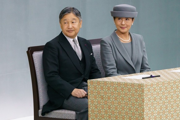TOKYO, JAPAN - AUGUST 15: Japanese Emperor Naruhito (L) and Empress Masako (R) attend the National Memorial Service for War Dead at the Nippon Budokan indoor arena on August 15, 2026 in Tokyo, Japan.  ...