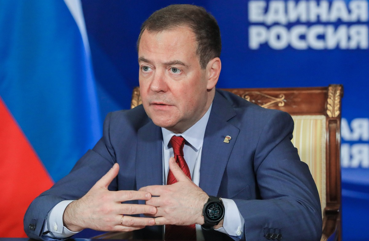 FILE - Russian Security Council Deputy Chairman and the head of the United Russia party Dmitry Medvedev chairs a meeting on saving businesses and jobs in foreign companies via video link at Gorki stat ...