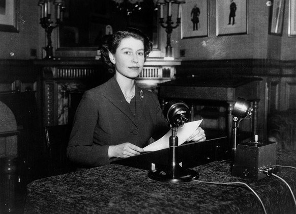 25th December 1952: Queen Elizabeth II making her first ever Christmas broadcast to the nation from Sandringham House, Norfolk.