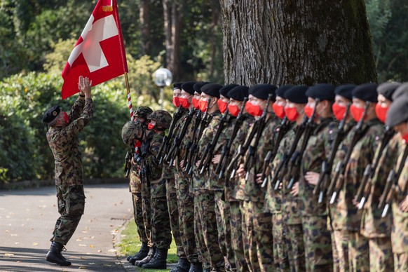 An officier of the Swiss Army checks the guard of honour ahead of the arrival of Austrian Chancellor Sebastian Kurz at the Lohn residence of the Swiss government, on Friday, September 18, 2020 in Kehr ...
