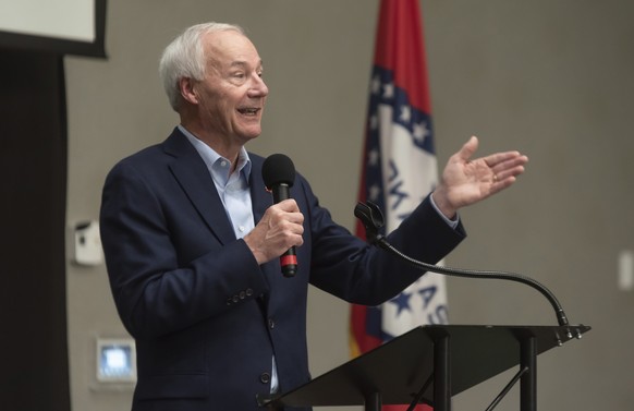 FILE - In this July 15, 2021, file photo, Arkansas Gov. Asa Hutchinson speaks during a town hall meeting in Texarkana, Ark. Facing growing vaccine hesitancy, governors in states hard hit by the corona ...