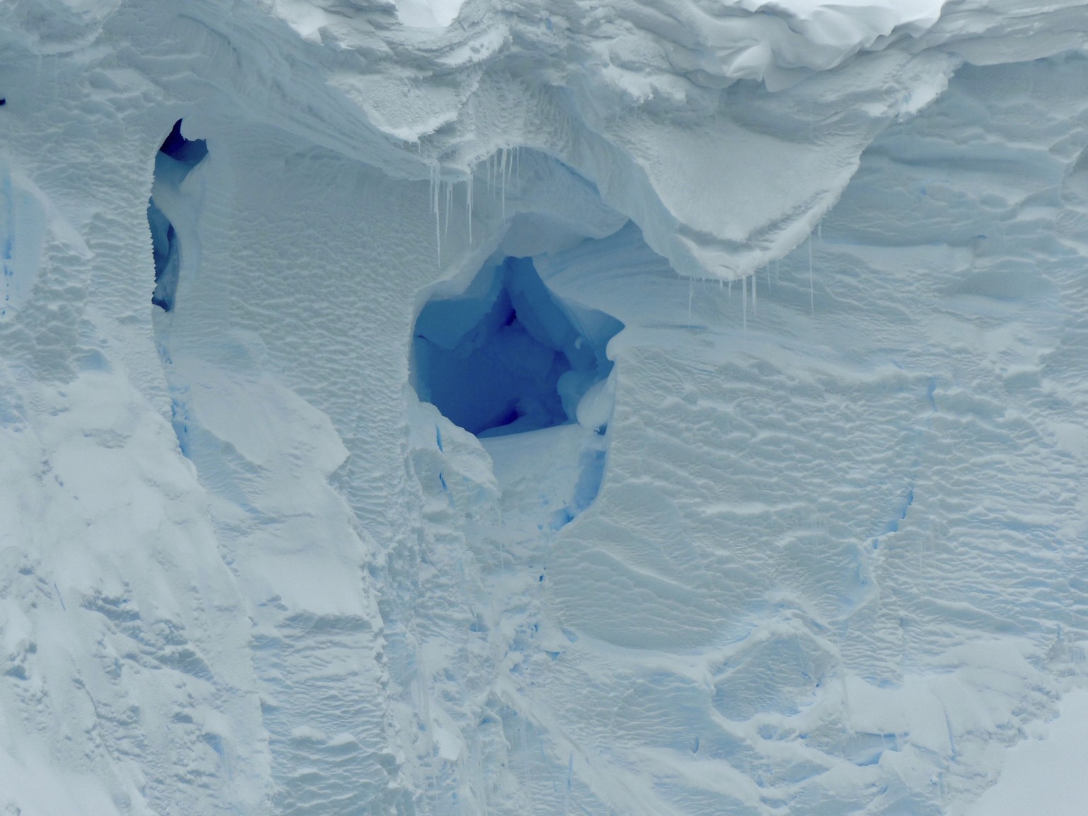 This 2019 photo provided by the British Antarctic Survey shows a hole in the Thwaites glacier in Antarctica. Starting Thursday, Jan. 6, 2021, a team of scientists are sailing to the massive but meltin ...