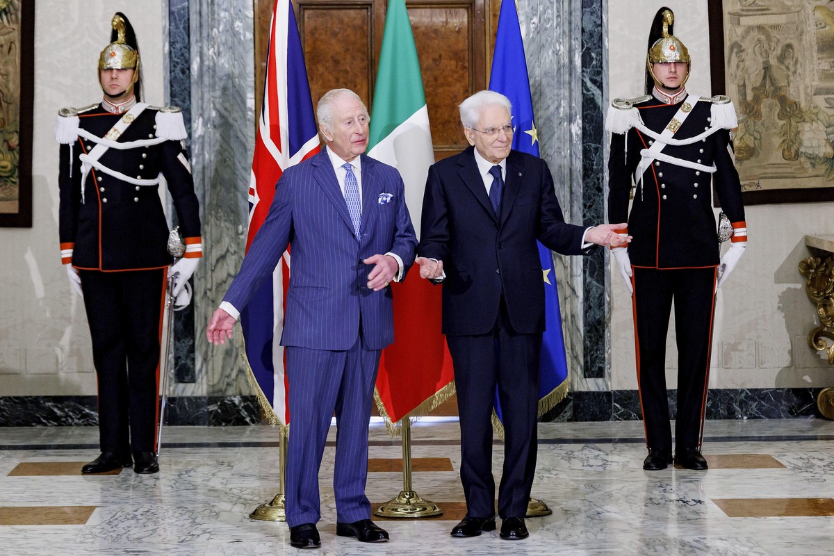 Italian President Sergio Mattarella, center right, and Britain's King Charles III gesture on the occasion of their meeting at the Quirinale Presidential Palace, in Rome, Tuesday, April 8, 2025 (R ...