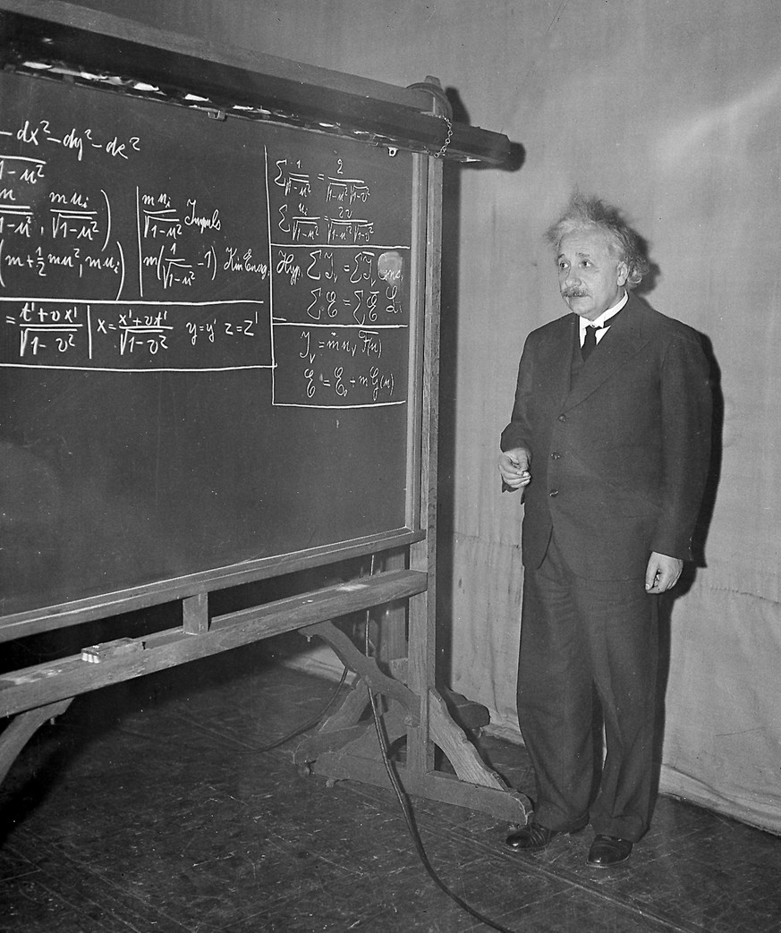 FILE - In this Dec. 28, 1934 file photo, Albert Einstein uses a blackboard as he speaks at a meeting of the American Association for the Advancement of Science in Pittsburgh, Pa. In 1915, then a littl ...