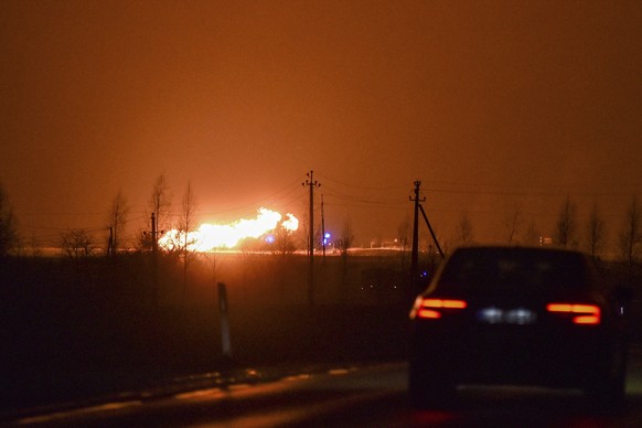 A flame rises after an explosion at a gas pipeline near Pasvalys, 175 km (109 miles) north of Vilnius in northern Lithuania on Friday, January 13, 2023. Officials say an explosion occurred in a pipeline…