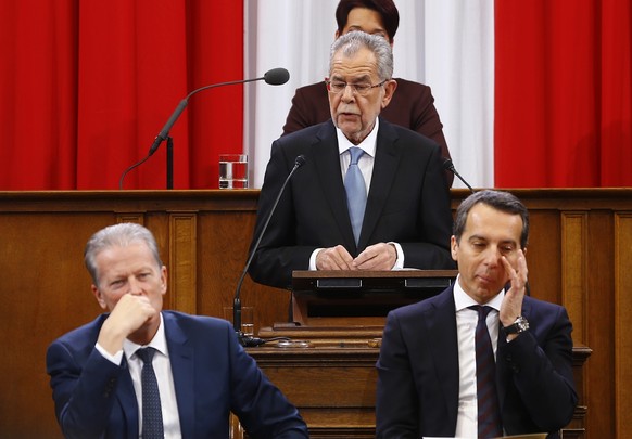 Austrian President Alexander Van der Bellen makes a speech as Chancellor Christian Kern and Vice Chancellor Reinhold Mitterlehner listen at the Federal Assembly in Vienna, Austria, January 26, 2017. R ...