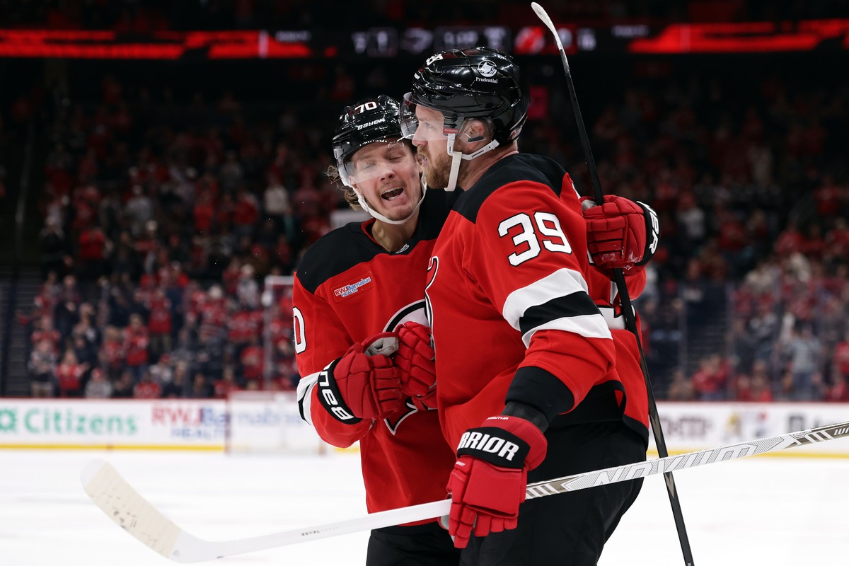 New Jersey Devils right wing Anthony Mantha (39) is congratulated by Jesper Boqvist (70) after scoring a goal during the second period of an NHL hockey game against the Los Angeles Kings, Saturday, Oc ...