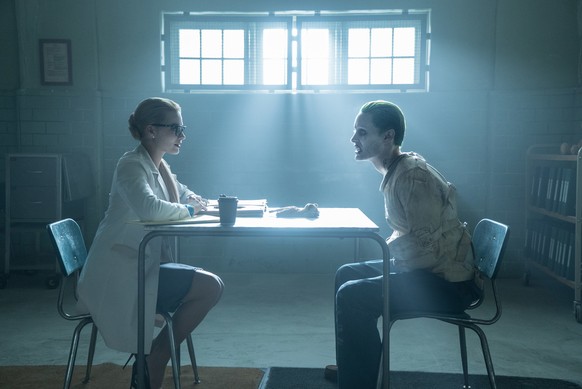 This image released by Warner Bros. Pictures shows Margot Robbie, left, and Jared Leto in a scene from, &quot;Suicide Squad.&quot; (Clay Enos/Warner Bros. Pictures via AP)