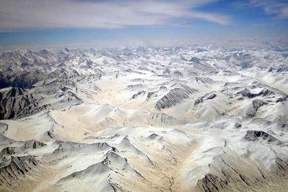 An aerial view of Karakoram mountains range, Pakistan, Saturday 07 May 2005. The Karakoram and the Himalaya are important to Earth scientists for several reasons. They are one of the world&#039;s most ...