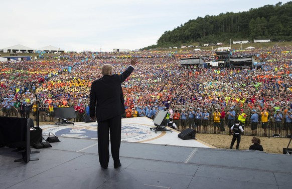President Donald Trump waves to the crowd after speaking at the 2017 National Scout Jamboree in Glen Jean, W.Va., Monday, July 24, 2017. (AP Photo/Carolyn Kaster)