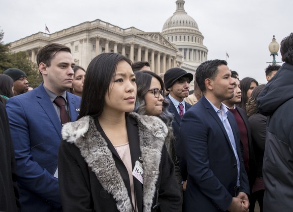 &quot;Dreamers,&quot; people brought to the U.S. illegally as children, and other supporters of the Deferred Action for Childhood Arrivals program, listen as lawmakers speak at the Capitol in Washingt ...