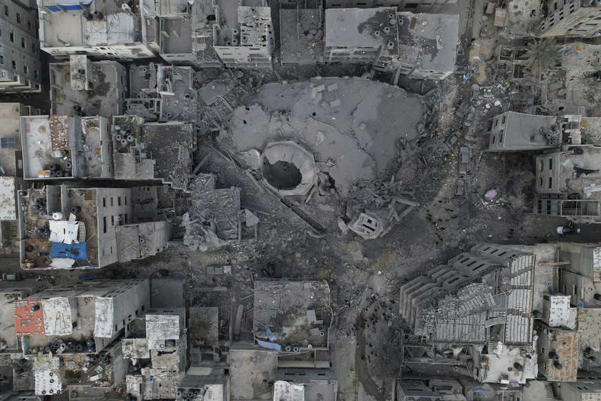 The rubble of a mosque, destroyed in an Israeli airstrike, is seen at Shati refugee camp in Gaza City early Monday, Oct. 9, 2023. Israel&#039;s military battled to drive Hamas fighters out of southern ...
