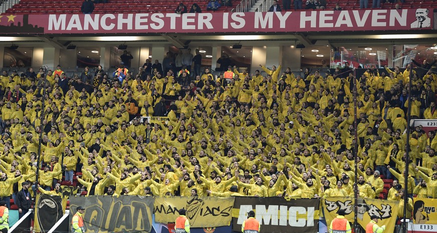 The fans from Bern celebrate ahead of the UEFA Champions League Group H matchday 5 soccer match between England&#039;s Manchester United FC and Switzerland&#039;s BSC Young Boys in the Old Trafford st ...