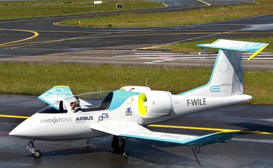 French airline pilot Didier Estyene prepares to fly an E-Fan, an electrically powered general aviation aircraft, at Merignac airport, near Bordeaux, southwestern France, Friday, April 25, 2014. Friday ...