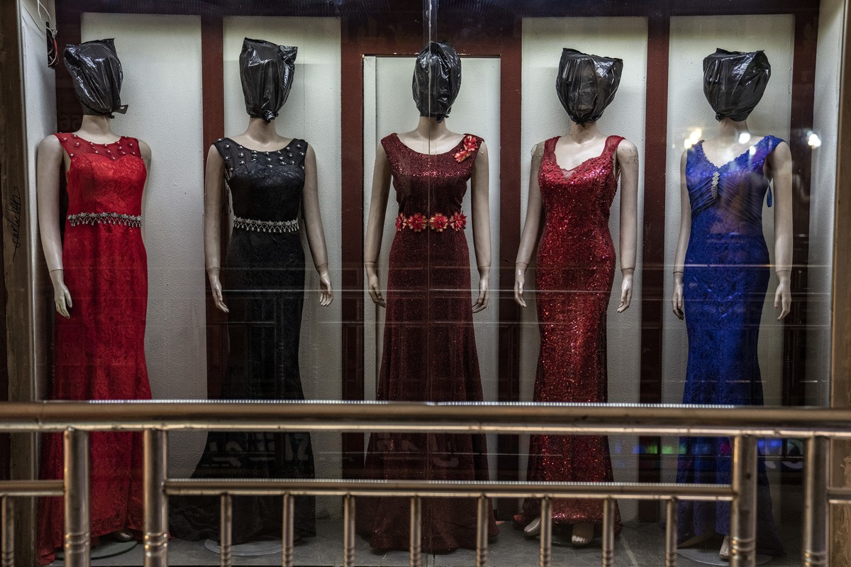 Mannequin's heads are covered in a women's dress store store in Kabul, Afghanistan, Monday, Dec. 26, 2022. Under the Taliban, the mannequins in women's dress shops across the Afghan cap ...