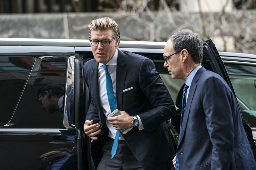 epa06643149 Lawyer Alex Van Der Zwaan (L) arrives outside the DC Federal Courthouse before hearing his sentence for making false statements to federal investigators in Washington, DC, USA, 03 April 20 ...