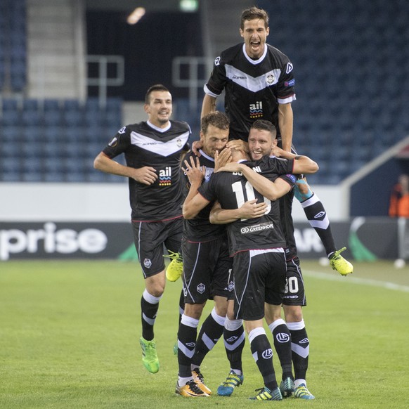 The players from Lugano react after scoring the 1-0 goal, during the UEFA Europa League group G match between Switzerland&#039;s FC Lugano and Romania&#039;s FC Steaua Bucharest, on Thursday, Septembe ...